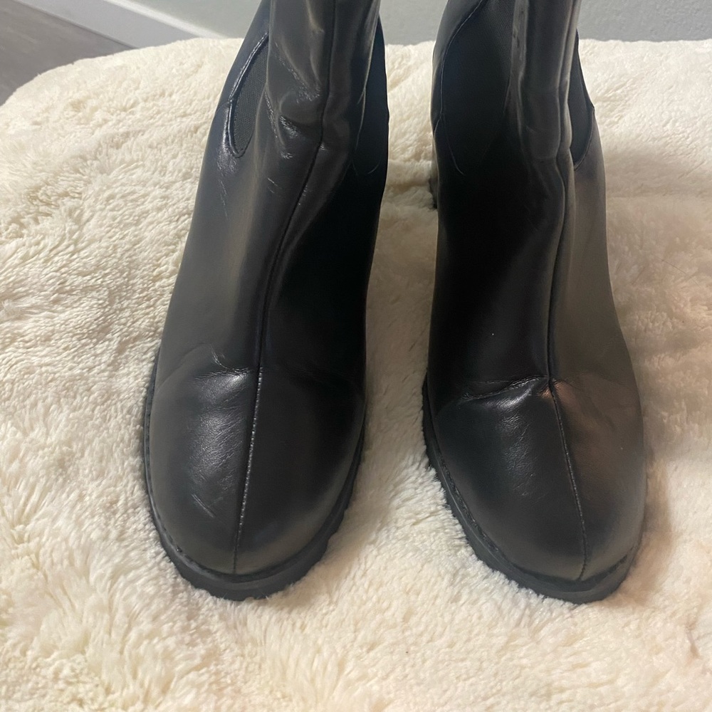 Black shoes on a light platform and thick heel